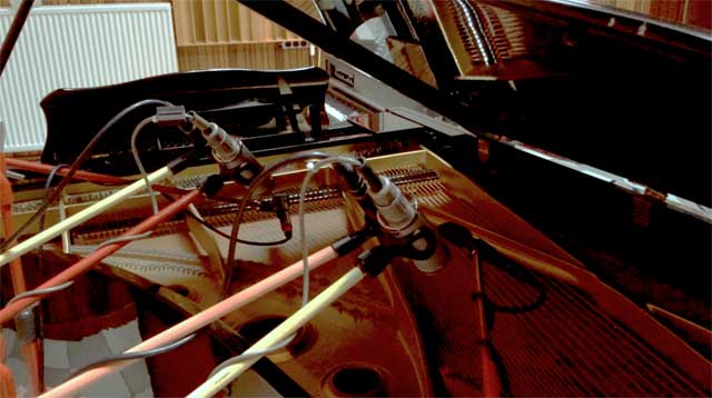 Photo showing microphone placement on the piano at ICP Studios